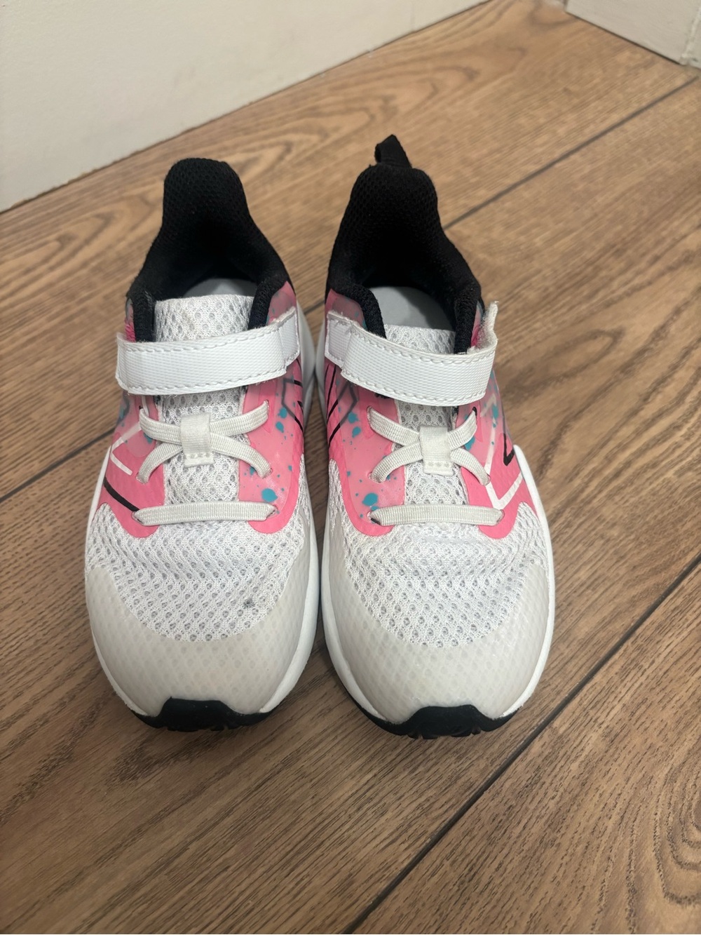 New Balance Kids White and Pink Sneakers with Black Trim